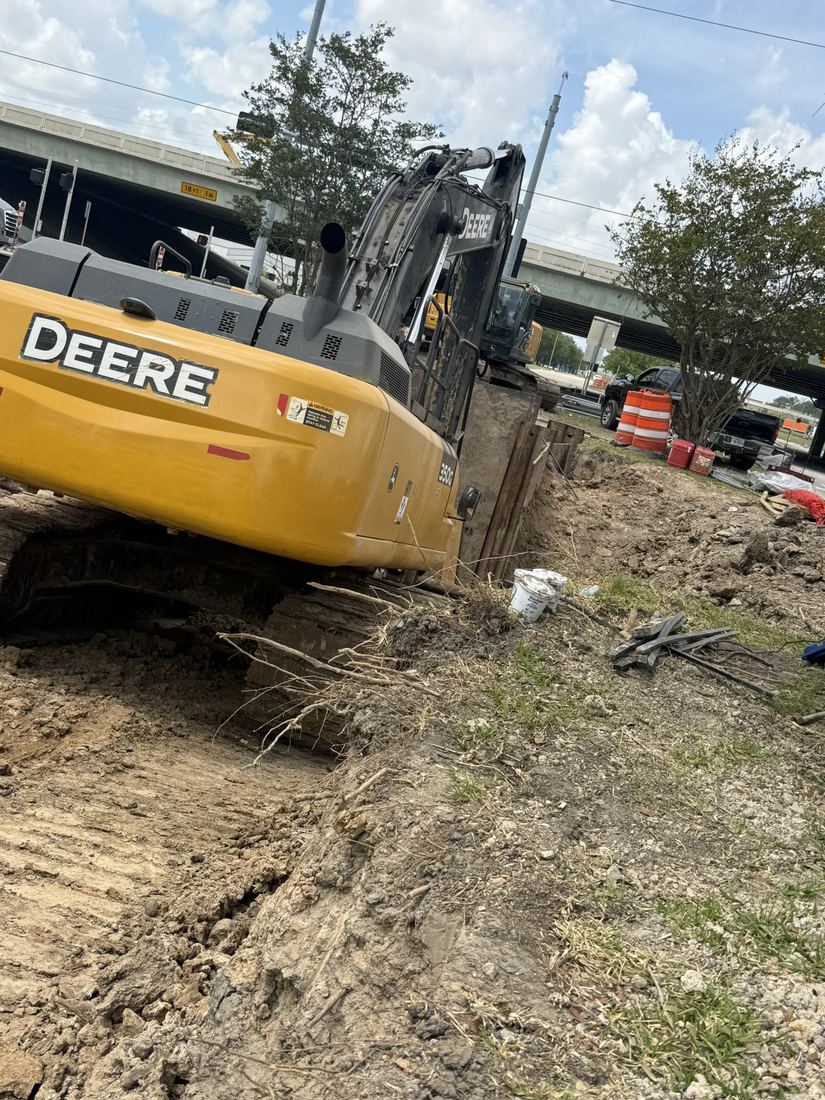 John Deere excavator at 36 inch dry bore, Humble TX