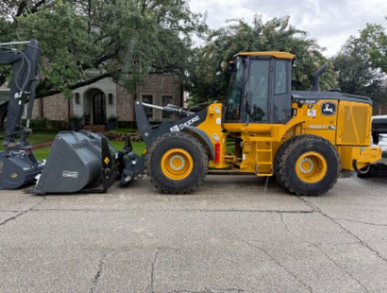 John Deere equipment mobilized for Bellaire WA2205 water and wastewater project