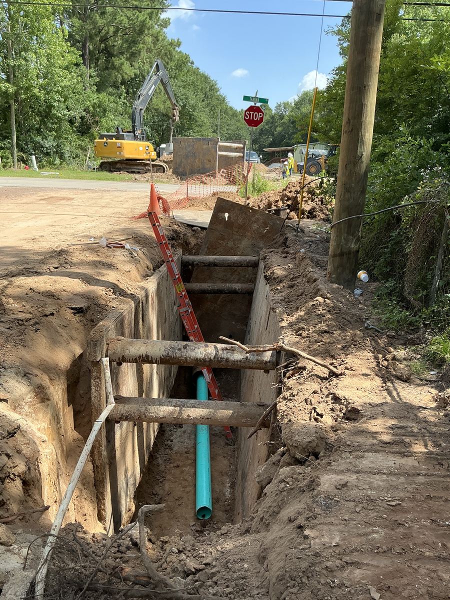 ISJ Underground Utilities crew installing utilities on Tamina Road